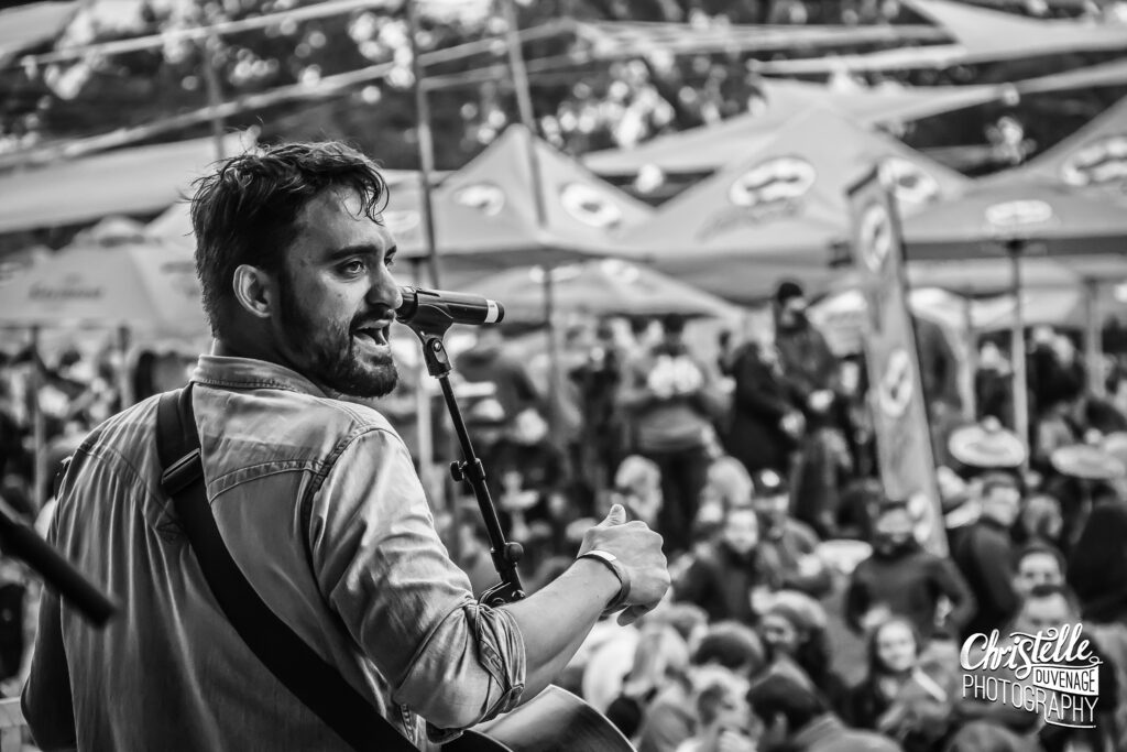 Philip Godfrey performing live at a South African music festival